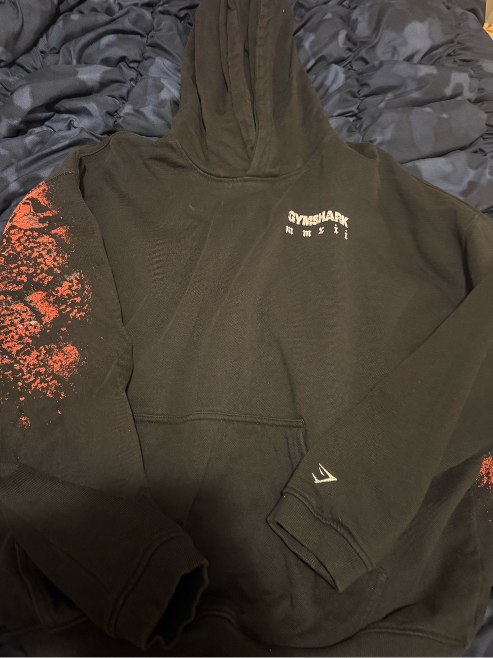 Gymshark Black Hoodie with Red Sleeve Paint Detail